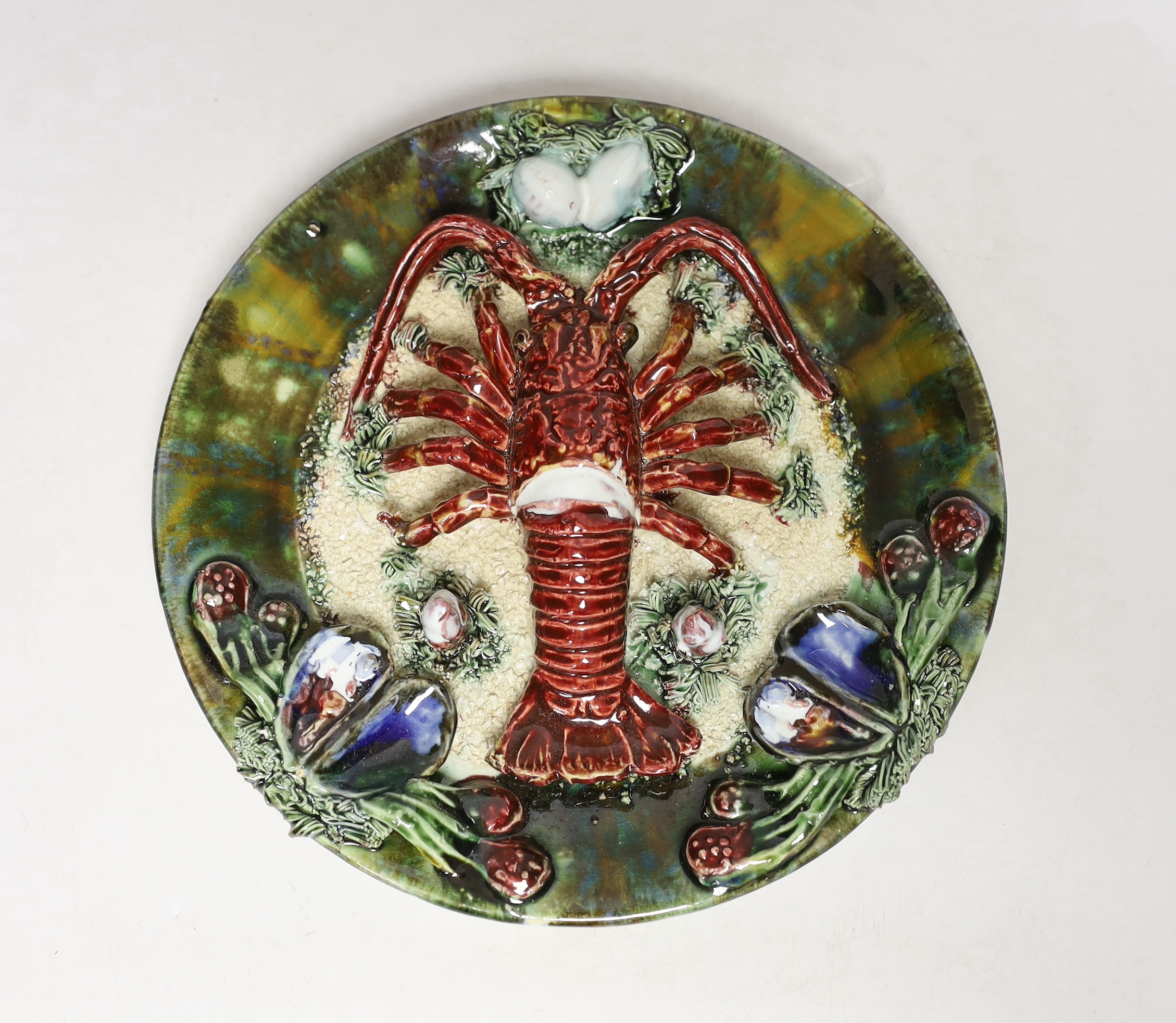 A Caldas Da Rainha Pallisy type dish, indistinct stamp to reverse, 23cm